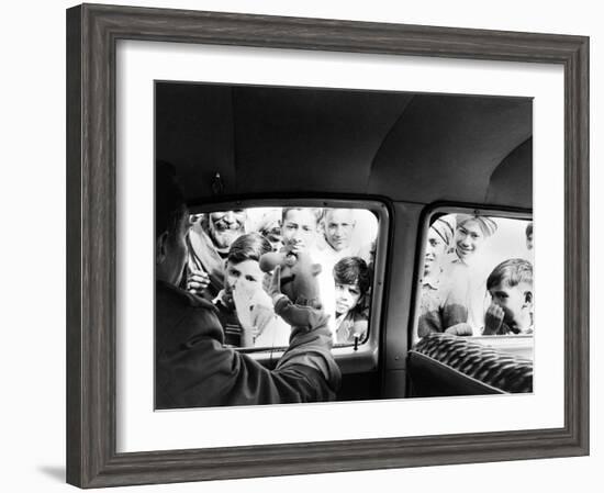 Indian children looking into puppeteer Bil Baird's car, March 1962.-James Burke-Framed Premium Photographic Print