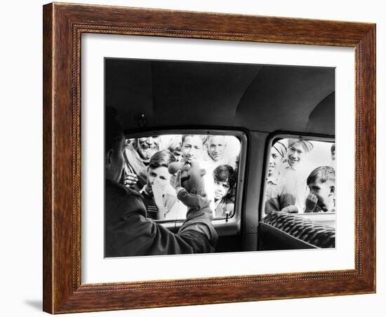 Indian children looking into puppeteer Bil Baird's car, March 1962.-James Burke-Framed Premium Photographic Print