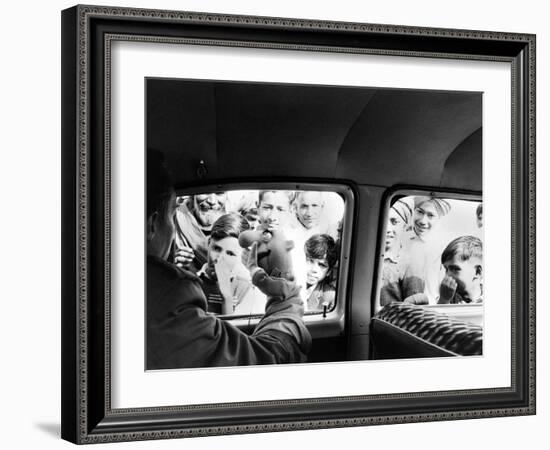 Indian children looking into puppeteer Bil Baird's car, March 1962.-James Burke-Framed Premium Photographic Print