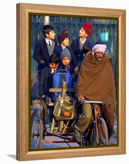 Indian Children Ride to School on the Back of a Cycle Rickshaw-null-Framed Premier Image Canvas