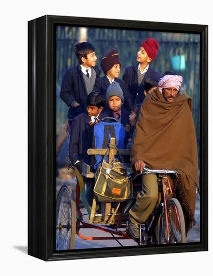 Indian Children Ride to School on the Back of a Cycle Rickshaw-null-Framed Premier Image Canvas
