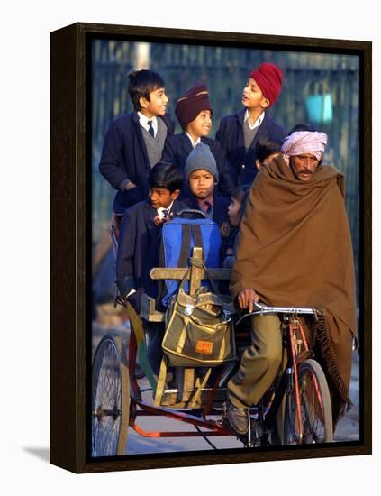 Indian Children Ride to School on the Back of a Cycle Rickshaw-null-Framed Premier Image Canvas