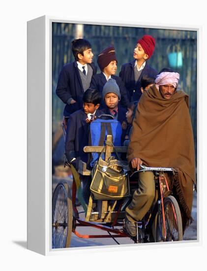 Indian Children Ride to School on the Back of a Cycle Rickshaw-null-Framed Premier Image Canvas