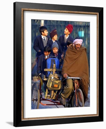 Indian Children Ride to School on the Back of a Cycle Rickshaw-null-Framed Photographic Print