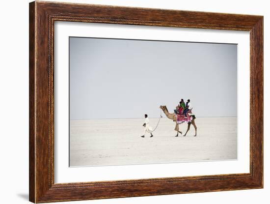 Indian Family Enjoying a Camel Ride in the White Desert-Annie Owen-Framed Photographic Print