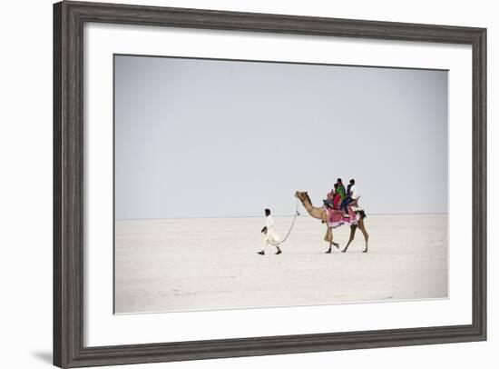 Indian Family Enjoying a Camel Ride in the White Desert-Annie Owen-Framed Photographic Print