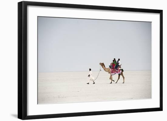 Indian Family Enjoying a Camel Ride in the White Desert-Annie Owen-Framed Photographic Print