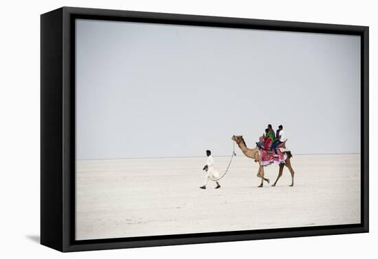 Indian Family Enjoying a Camel Ride in the White Desert-Annie Owen-Framed Premier Image Canvas