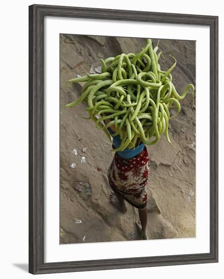 Indian Farmer Carries Cucumbers to Sell in the Market on the Outskirts of Allahabad, India-null-Framed Photographic Print