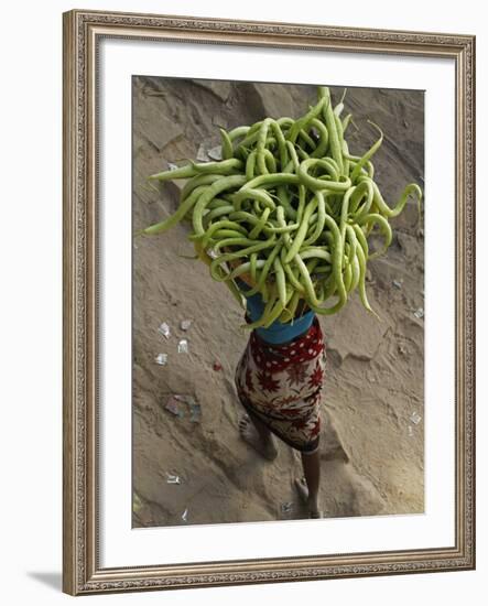 Indian Farmer Carries Cucumbers to Sell in the Market on the Outskirts of Allahabad, India-null-Framed Photographic Print