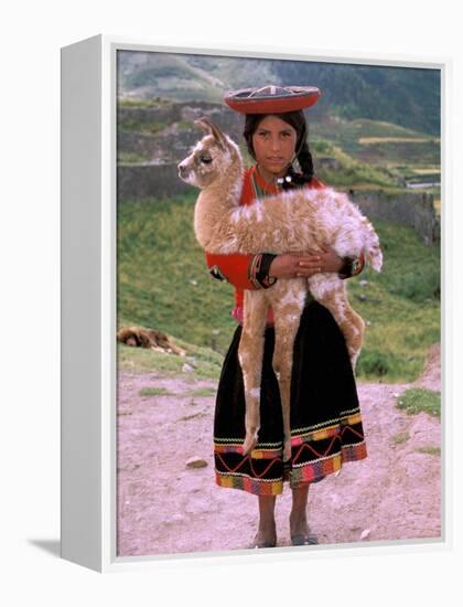 Indian Girl with Llama, Cusco, Peru-Pete Oxford-Framed Premier Image Canvas