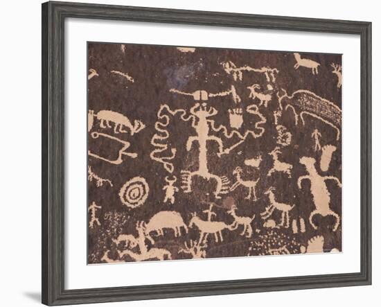 Indian Petroglyphs Drawn on Red Standstone by Scratching Away Dark Desert Varnish of Iron Oxides-Tony Waltham-Framed Photographic Print