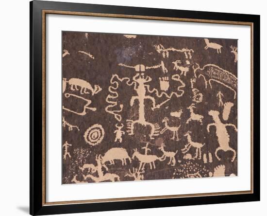 Indian Petroglyphs Drawn on Red Standstone by Scratching Away Dark Desert Varnish of Iron Oxides-Tony Waltham-Framed Photographic Print