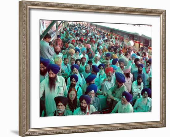 Indian Sikh Pilgrims Wait for Immigration Clearance at Wagah Railway Station Near Lahore-null-Framed Photographic Print