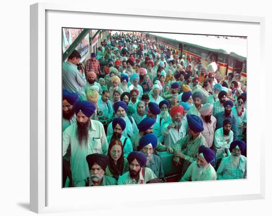 Indian Sikh Pilgrims Wait for Immigration Clearance at Wagah Railway Station Near Lahore-null-Framed Photographic Print