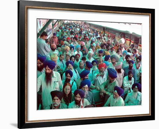 Indian Sikh Pilgrims Wait for Immigration Clearance at Wagah Railway Station Near Lahore-null-Framed Photographic Print