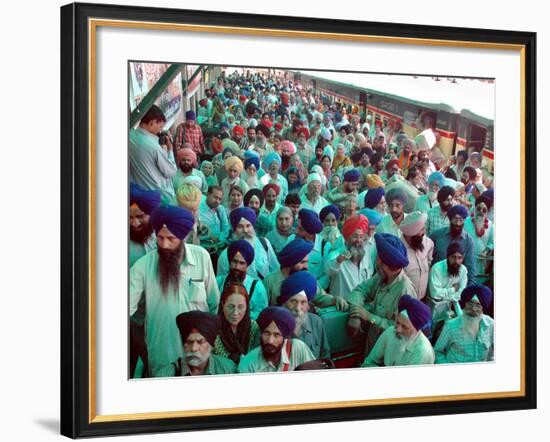 Indian Sikh Pilgrims Wait for Immigration Clearance at Wagah Railway Station Near Lahore--Framed Photographic Print