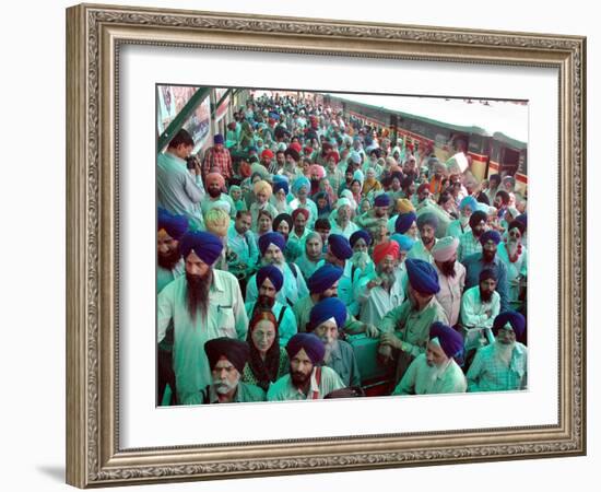 Indian Sikh Pilgrims Wait for Immigration Clearance at Wagah Railway Station Near Lahore-null-Framed Photographic Print