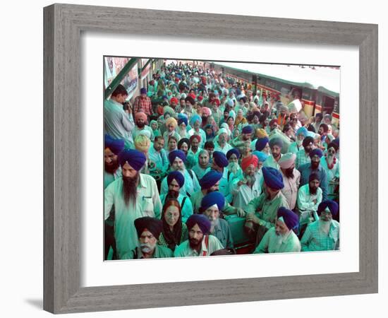 Indian Sikh Pilgrims Wait for Immigration Clearance at Wagah Railway Station Near Lahore-null-Framed Photographic Print