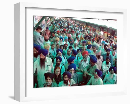 Indian Sikh Pilgrims Wait for Immigration Clearance at Wagah Railway Station Near Lahore-null-Framed Photographic Print