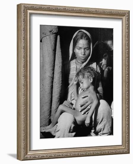 Indian Wife of a Tannery Worker Holding Her Child at Home in the Chawls-Margaret Bourke-White-Framed Photographic Print