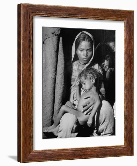 Indian Wife of a Tannery Worker Holding Her Child at Home in the Chawls-Margaret Bourke-White-Framed Photographic Print