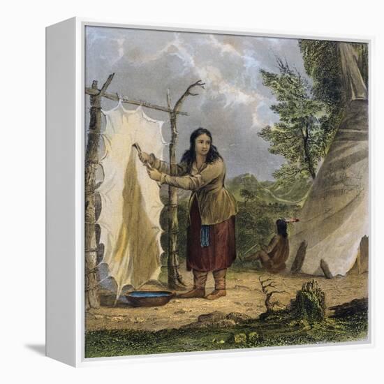 Indian Woman Dressing a Buffalo Skin-Seth Eastman-Framed Premier Image Canvas