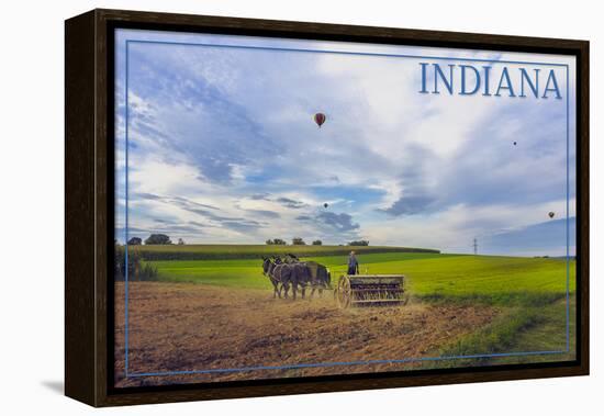 Indiana - Amish Farmer and Hot Air Balloons-Lantern Press-Framed Stretched Canvas