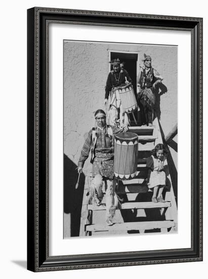 Indians Descending Wooden Stairs Carrying Drums, Dance San Ildefonso Pueblo New Mexico 1942-Ansel Adams-Framed Art Print