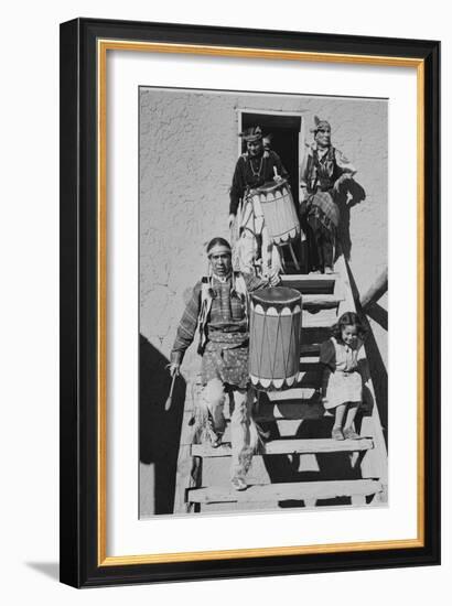 Indians Descending Wooden Stairs Carrying Drums, Dance San Ildefonso Pueblo New Mexico 1942-Ansel Adams-Framed Art Print