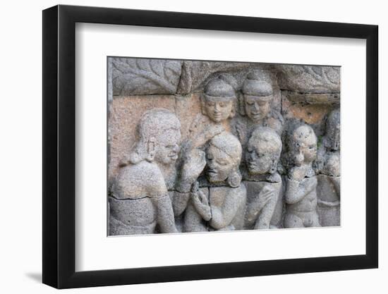 Indonesia, Java, Borobudur. Largest Buddhist monument in the world. Carved stone figures-Cindy Miller Hopkins-Framed Photographic Print