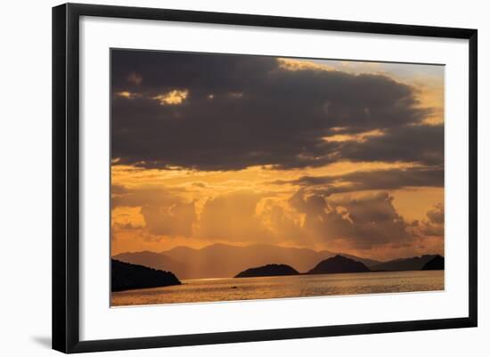 Indonesia, Lesser Sunda Islands, Rinca. Sunset over Komodo Island.-Nigel Pavitt-Framed Photographic Print