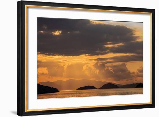 Indonesia, Lesser Sunda Islands, Rinca. Sunset over Komodo Island.-Nigel Pavitt-Framed Photographic Print