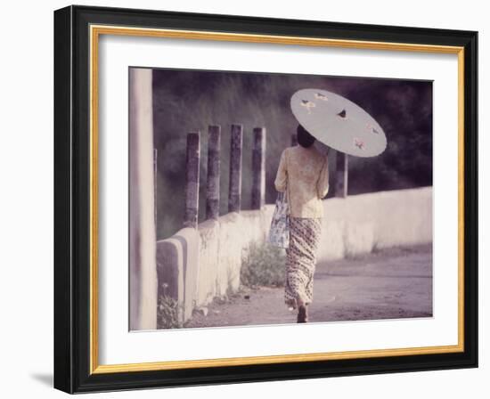Indonesian Woman with a Parasol-Co Rentmeester-Framed Photographic Print