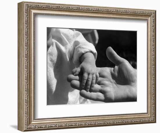 Infant's Hand in Man's Hand-Philip Gendreau-Framed Photographic Print