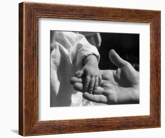 Infant's Hand in Man's Hand-Philip Gendreau-Framed Photographic Print