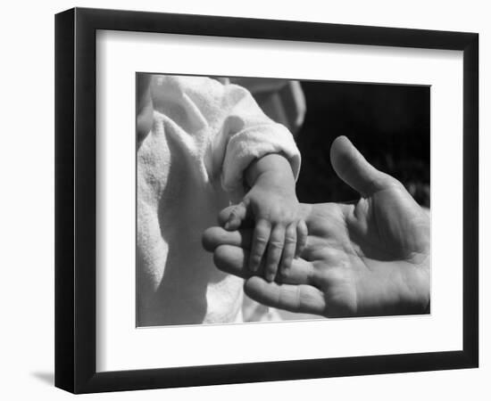 Infant's Hand in Man's Hand-Philip Gendreau-Framed Photographic Print