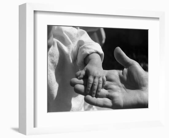 Infant's Hand in Man's Hand-Philip Gendreau-Framed Photographic Print