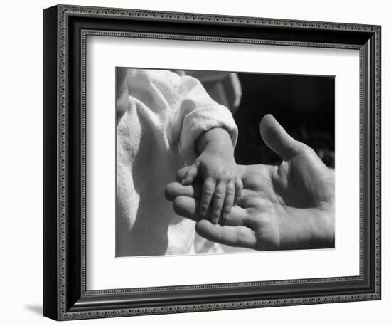 Infant's Hand in Man's Hand-Philip Gendreau-Framed Photographic Print