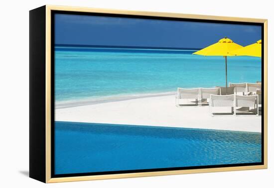 Infinity Pool and Lounge Chairs, Maldives, Indian Ocean, Asia-Sakis Papadopoulos-Framed Premier Image Canvas