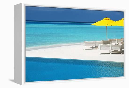 Infinity Pool and Lounge Chairs, Maldives, Indian Ocean, Asia-Sakis Papadopoulos-Framed Premier Image Canvas