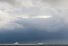 Norway. Svalbard. Hornsund. Heavy Clouds over the Calm Water-Inger Hogstrom-Photographic Print