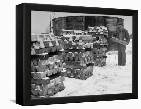 Ingot of Magnesium, Part of the U.S. Strategic Materials Stockpile, Stacked and Covered with Snow-Ed Clark-Framed Premier Image Canvas