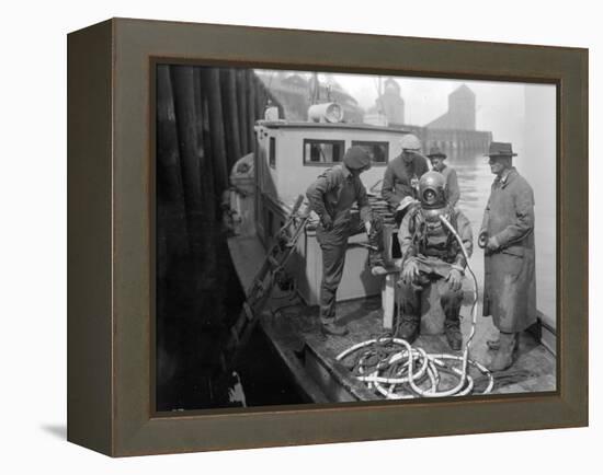 Inspecting the Piles at Tacoma, Diver on Deck in Suit, 1924-Asahel Curtis-Framed Premier Image Canvas