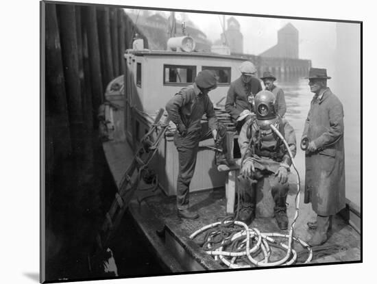 Inspecting the Piles at Tacoma, Diver on Deck in Suit, 1924-Asahel Curtis-Mounted Giclee Print