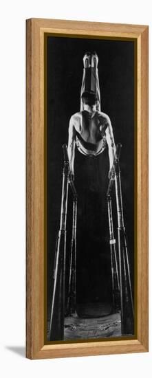 Intercollegiate Championship Gymnast Newt Loken Doing Back Somersault on Parallel Bars-Gjon Mili-Framed Premier Image Canvas