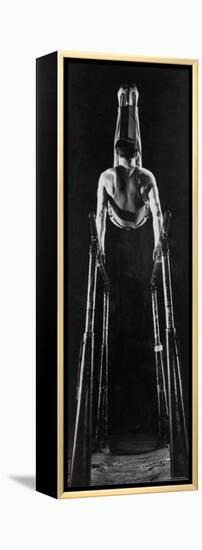 Intercollegiate Championship Gymnast Newt Loken Doing Back Somersault on Parallel Bars-Gjon Mili-Framed Premier Image Canvas