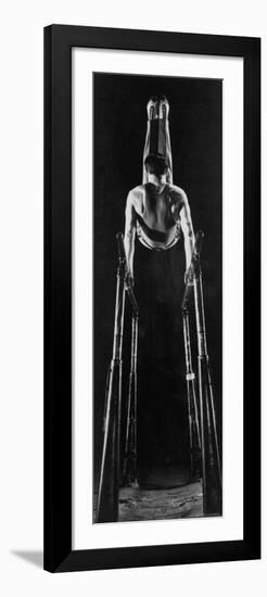 Intercollegiate Championship Gymnast Newt Loken Doing Back Somersault on Parallel Bars-Gjon Mili-Framed Photographic Print