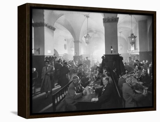 Interior of Munich Beer Hall, People Sitting at Long Tables, Toasting-Ralph Crane-Framed Premier Image Canvas