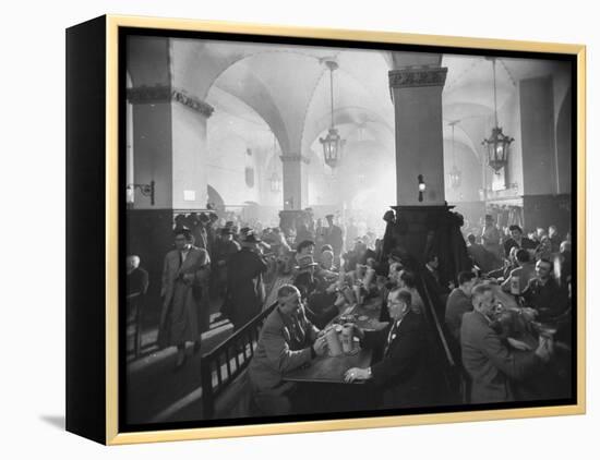 Interior of Munich Beer Hall, People Sitting at Long Tables, Toasting-Ralph Crane-Framed Premier Image Canvas